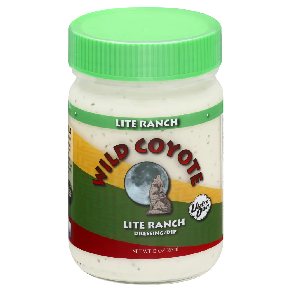 Earlier Wild Coyote Lite Ranch bottle with green cap and coyote-and-moon label