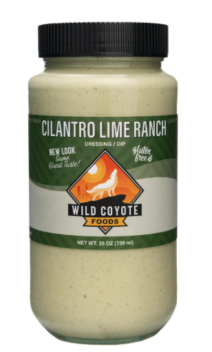 Actual Wild Coyote Foods Cilantro Lime Ranch dressing and dip in the finished 25-ounce jar with a black cap and green label